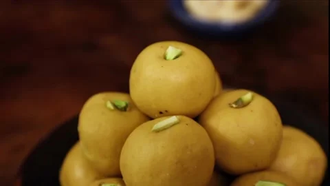 Besan laddu with dark background Stock Footage 211322132