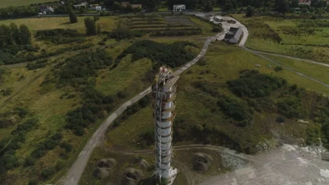 Up beside the sand, rock processing tower Stock Footage 210235675