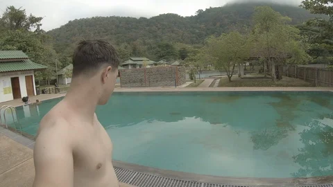 Beside a swimming pool at a hot spring area at Mae Hong Son, Thailand Stock Footage 101239833