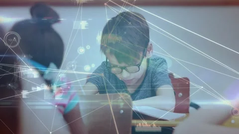 Bespectacled boy writing in school, camera pullback causing HUD overlaying scene Stock Footage 334111652