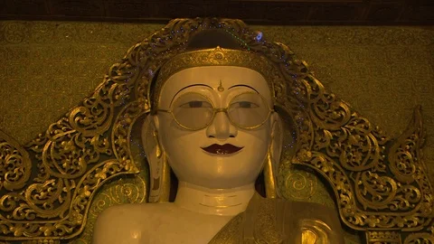 Bespectacled Buddha Medium shot Stock Footage 114984849