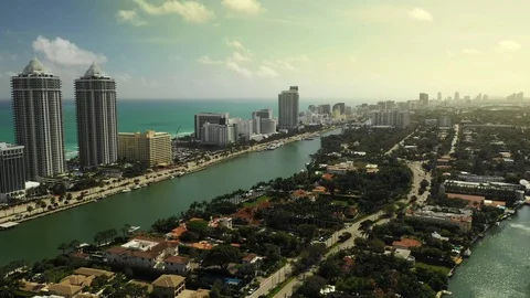 Best aerials of Miami Beach waterfront real estate condominium lifestyle Stock Footage