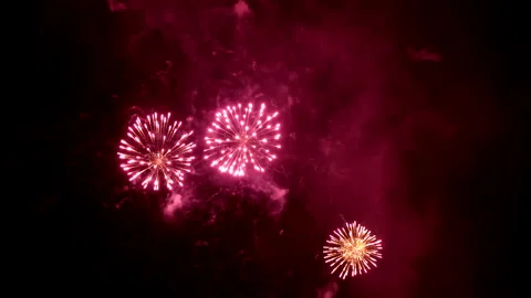 Best amazing beautiful color exploding fireworks a background night sky. 4K. Stock Footage 295886942