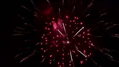 Best amazing beautiful color exploding fireworks a background night sky. 4K. Stock Footage 295888142