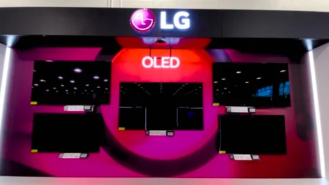 Best Buy interior technology of 2022 pan of LG OLED TV display Stock Footage 169868720