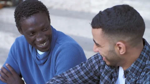 Best friend talking e laughing on the stairs Stock Footage 218594735
