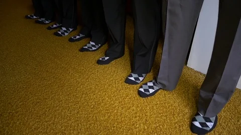 Best men lined up, demonstration their socks. Stock-Footage 74257539