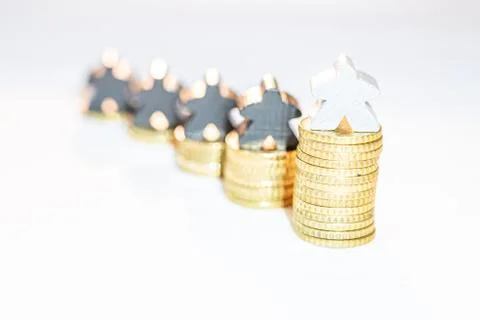 Best performance of persons shown with piles of ten cent coins and wooden mee Stock Photos