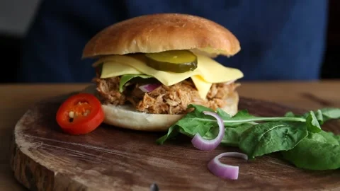 Best pulled pork sandwich on dark wood Stock Video Pond5