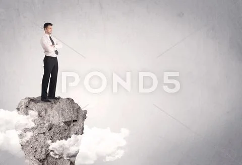 Best salesman on cliff in clear space Stock Photos