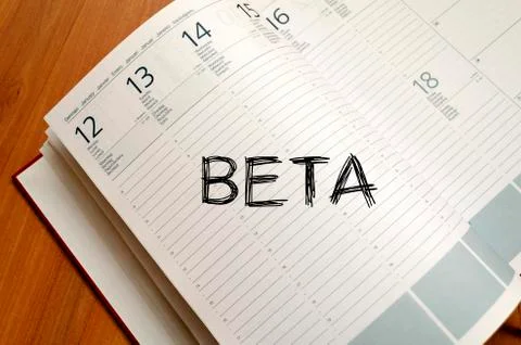Beta write on notebook Stock Photos