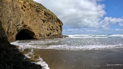 Bethells Cave, a dramatic sea cave located on Bethells Beach, also known as.. Stock Footage 284393418