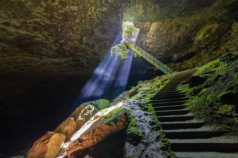 Between heaven and hell concept. The stair cave near Lovech, Bulgaria. Stock Photos
