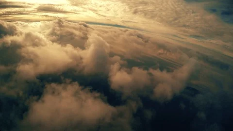 Between layers of Golden clouds Stock Footage 93604624