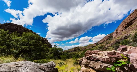 Between Mountain Peaks Time Lapse Stock Footage 57755109