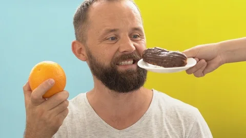 Between orange or chocolate c Stock Footage 110618001