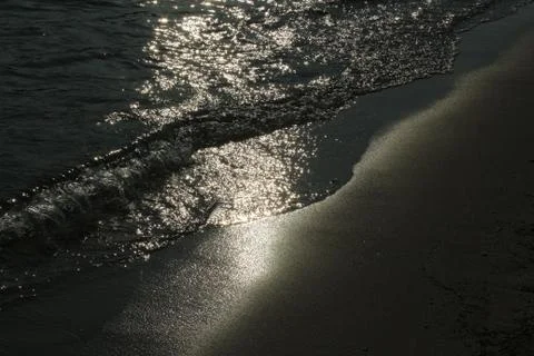 Between the sand and the water Stock Photos