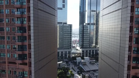 Between Skyscrapers Aerial Footage, Pullback Shot, Bright Daylight, Hong Kong Stock Footage 247934804
