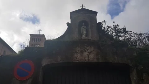 Between two churches, a Madonna with cross at Aventino, a winter day Stock Footage 168830611