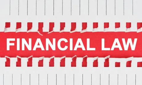 Between two sheets of notebook on a red background the inscription - FINANCIA Stock Photos