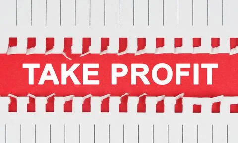 Between two sheets of notebook on a red background the inscription - TAKE PRO Stock Photos