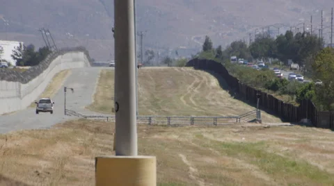 Between the US Mexican Border fences Otay Mesa Stock Footage 48608592
