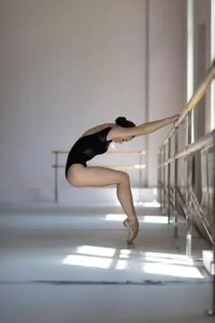 Beuatiful ballerina training in the class Stock Photos