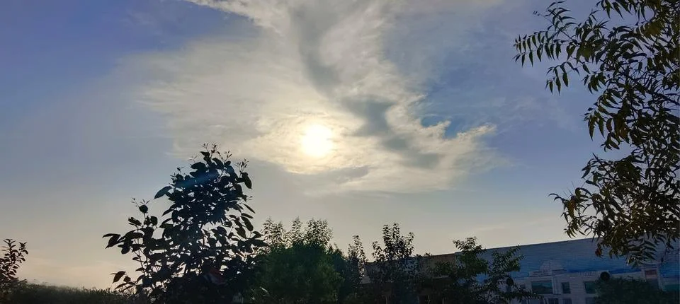 Beuatiful cloud view design. Blue colored sky with little light. Aesthetic .. Stock Photos