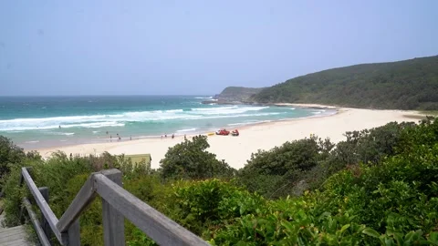 Beuatiful sandy beach with blue water and big waves. Stock Footage 130884450