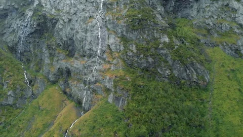 Beutiful nort landscape with a rock and some waterfalls Stock Footage 114386830