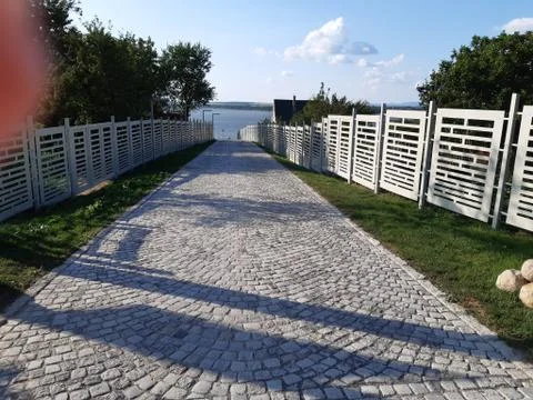 A beutiful stone path towards the river Danube . Stock Photos