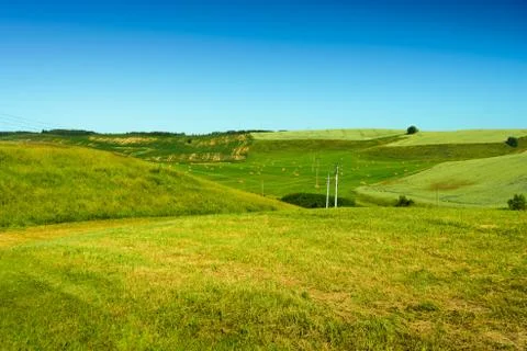 Bevelled green fields in Poland Stock Photos