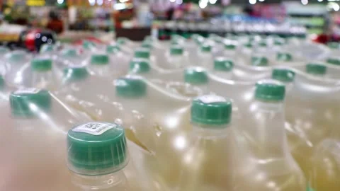 Beverage bottles drinks on supermarket shelf Stock-Footage 241745545