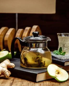 Beverage with herbs in the pot Stock Photos