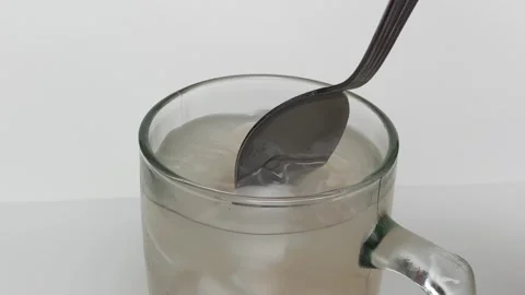 Beverage made from chilled or iced coconut water and young coconut flesh Video stock 293786397
