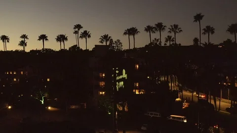 Beverly Hills Hotel at night, California, aerial rising reveal Stock Footage