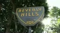 Beverly Hills sign handheld with sun and lens flare HD Footage