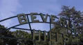 Beverly Hills Sign, Palm Trees, Street Sign, Los Angeles, California, Blue Sky HD Footage
