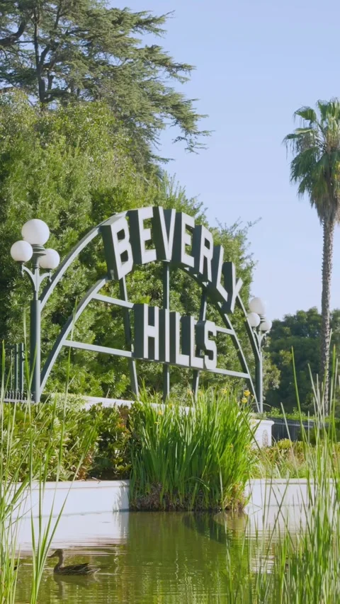Beverly Hills Sign Water Reflection Dolly Right Los Angeles Vertical Stock Footage 332681848