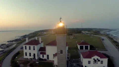 Bevertail Lighthouse in Jamestown, Rhode Island. Aerial at Sunset 動画素材 80255214