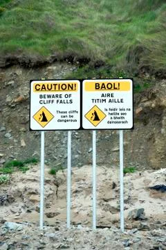 Beware of cliff falls signs Stock Photos