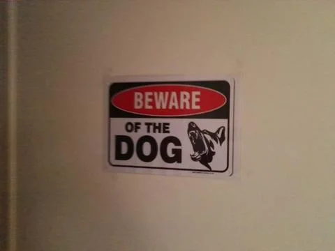 Beware of the dog poster. 스톡 사진