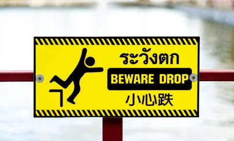 Beware drop sign Stock Photos