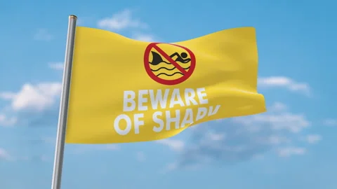 Beware of Shark Warning Flag Waving Against Blue Sky with Luma Matte Vídeos de archivo 347747402