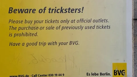 Beware of tricksters warning sign, scam and theft, Berlin, Germany Stock Footage 70732868