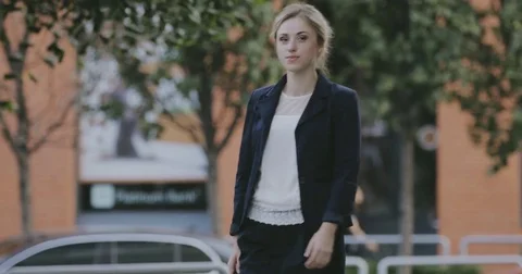 Bewildered woman searching smartphone in her female bag Stock Footage