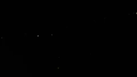 A bewitching firework exploding in the night sky showing a humongous Stock Footage 116754470