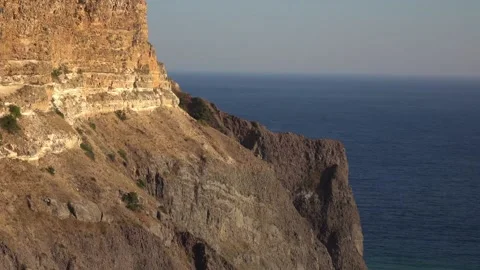 Bewitching look of seashore landscape with cliff over blue sea Stock Footage 131106327