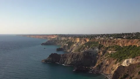 Bewitching look of seashore landscape with cliff over blue sea 動画素材 131106347