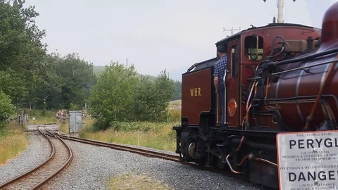 Beyer-Peacock NGG Class 16 Garratt No.138 leaving Rhyd Ddu station on the Wel Stock Footage 114963974